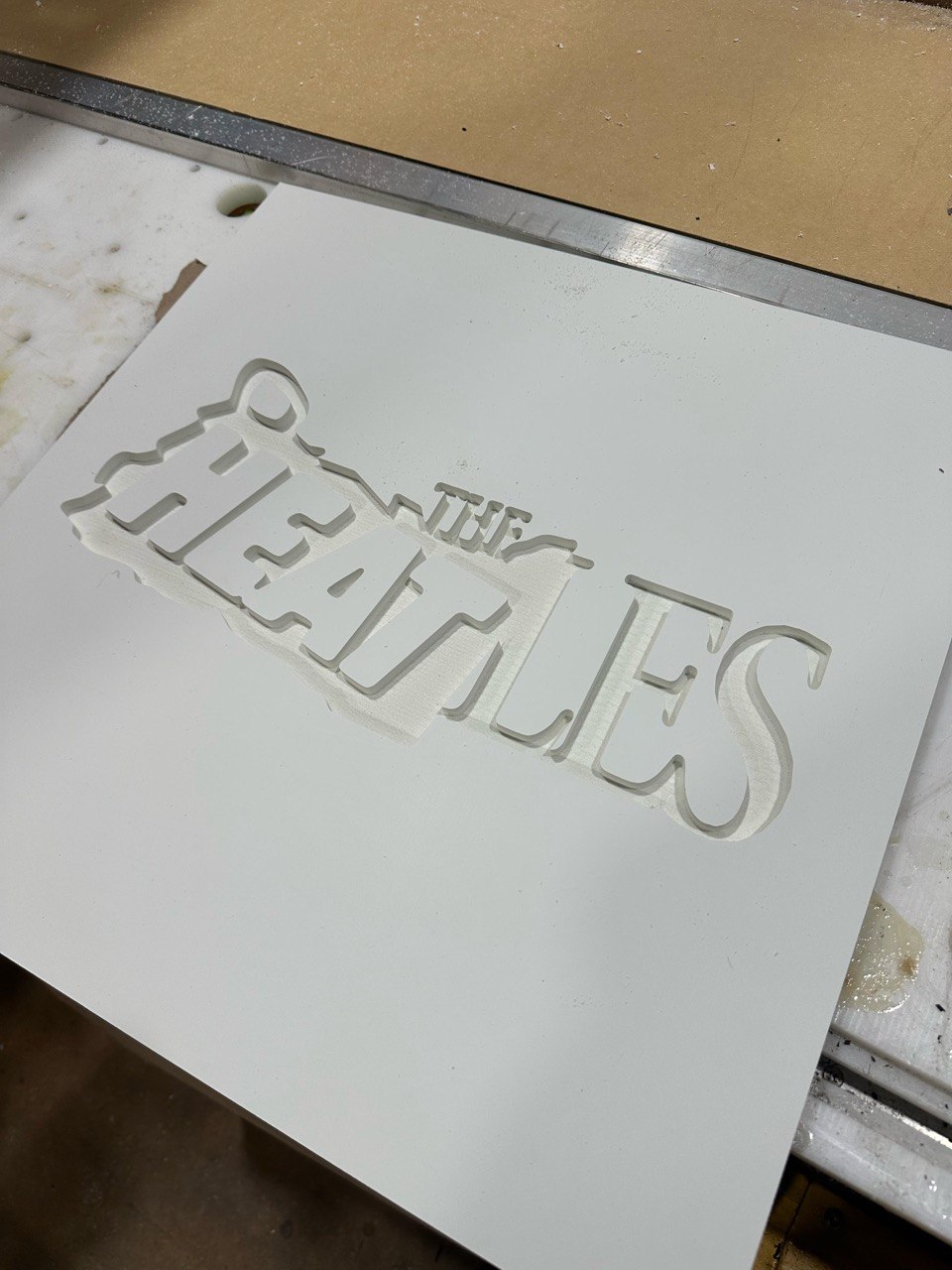 Custom CNC engraved sign, The Beatles design, fresh off the machine