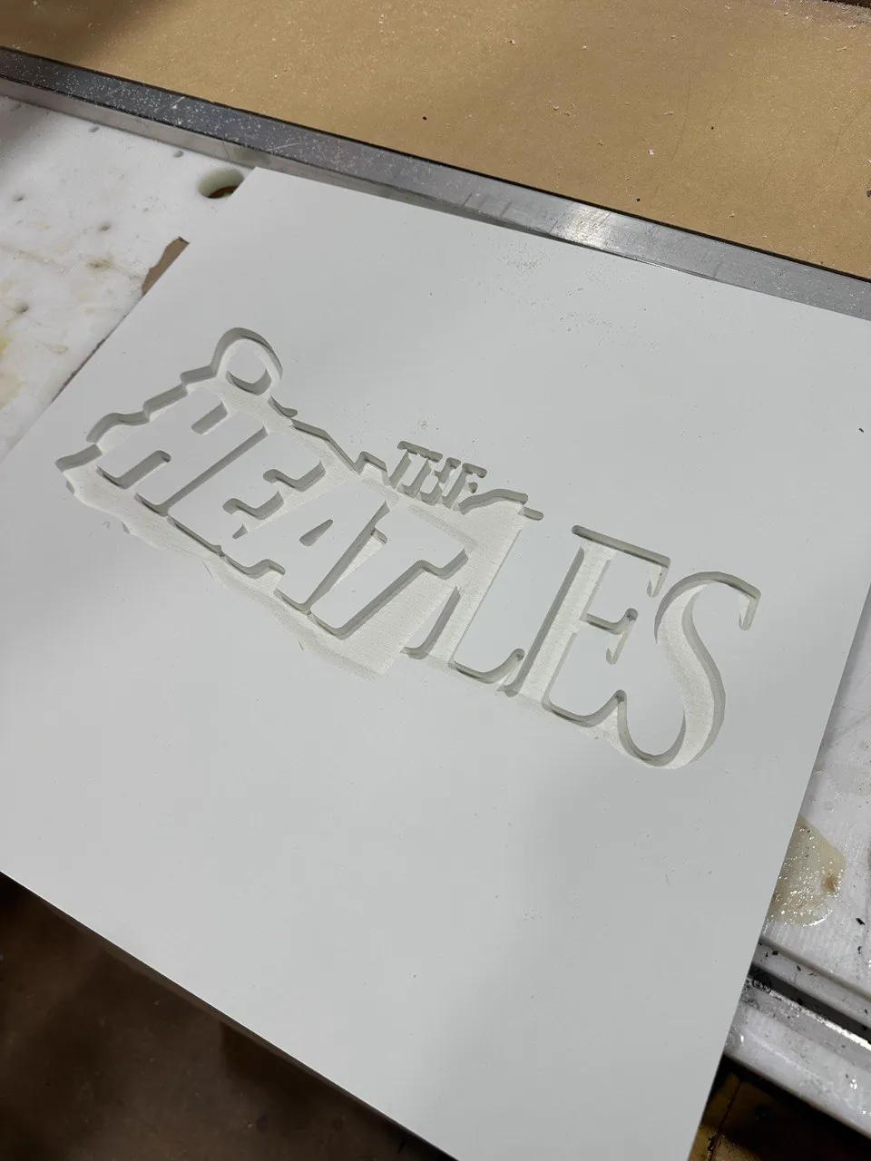 Custom CNC engraved sign, The Beatles design, fresh off the machine