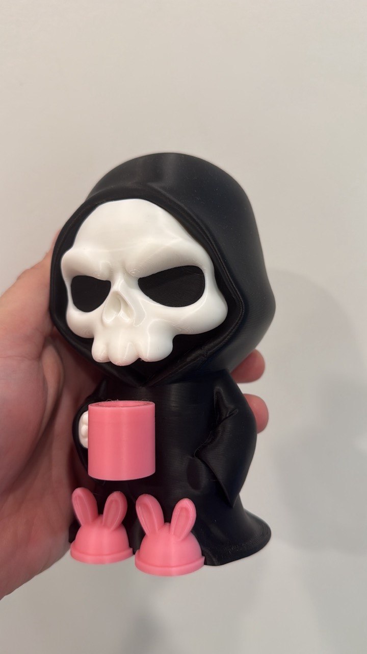 3D printed novelty grim reaper figurine in bunny slippers