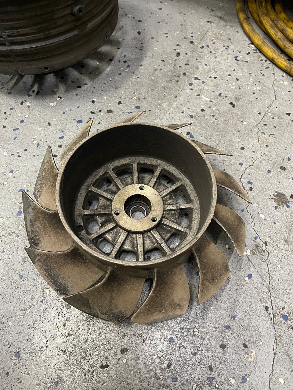 Worn metal fan impeller scanned for reprint