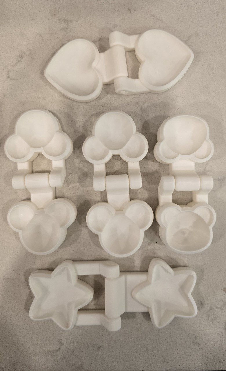 Custom 3D printed mold shapes: heart, star, mouse, bear