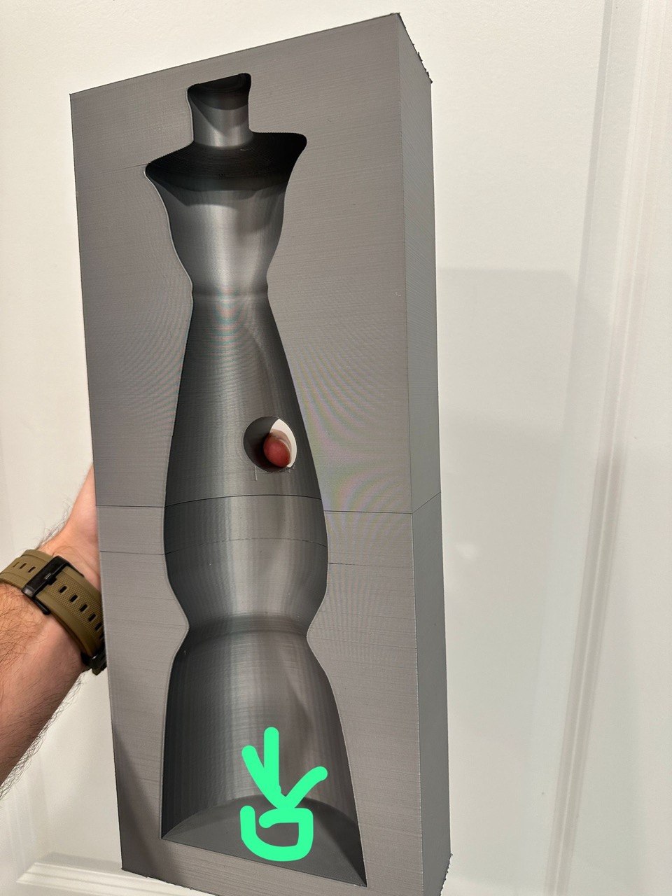 3D printed drilling jig designed to guide holes into a decorative bottle