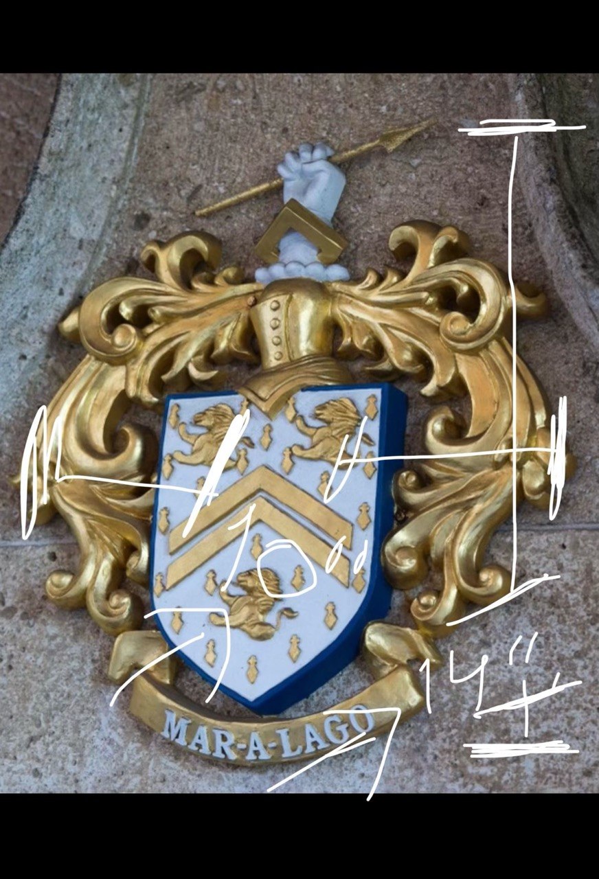 Physical crest photographed with hand-drawn dimension annotations