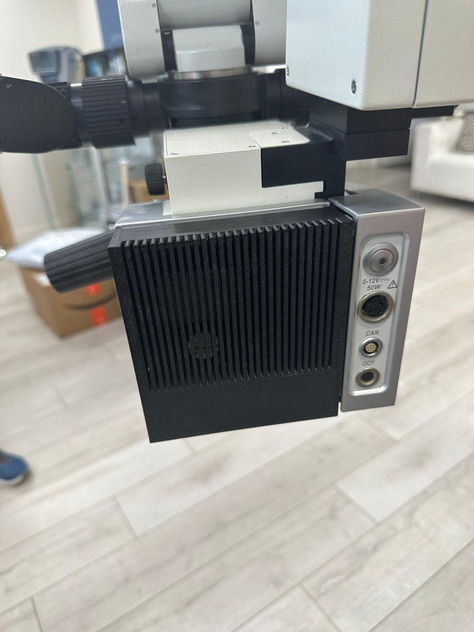 Close-up of a professional 3D scanner head on an articulated arm