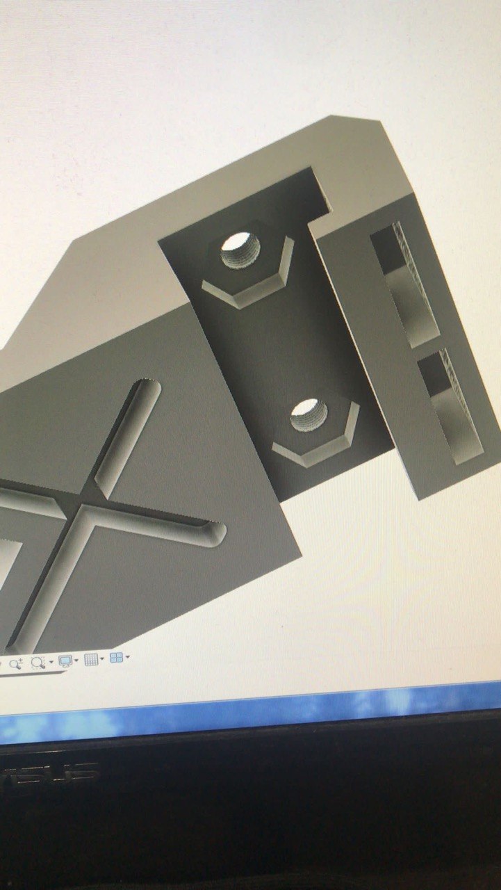 CAD software showing a threaded bracket model