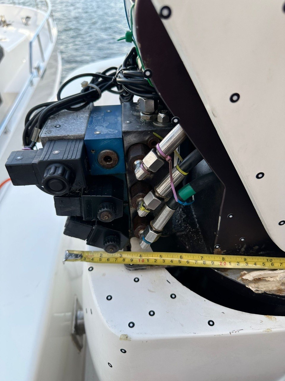 Tape measuring a yacht hydraulic valve block for reverse engineering