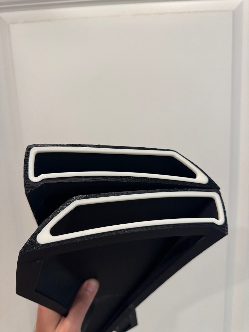 Two-tone black and white 3D printed automotive trim piece
